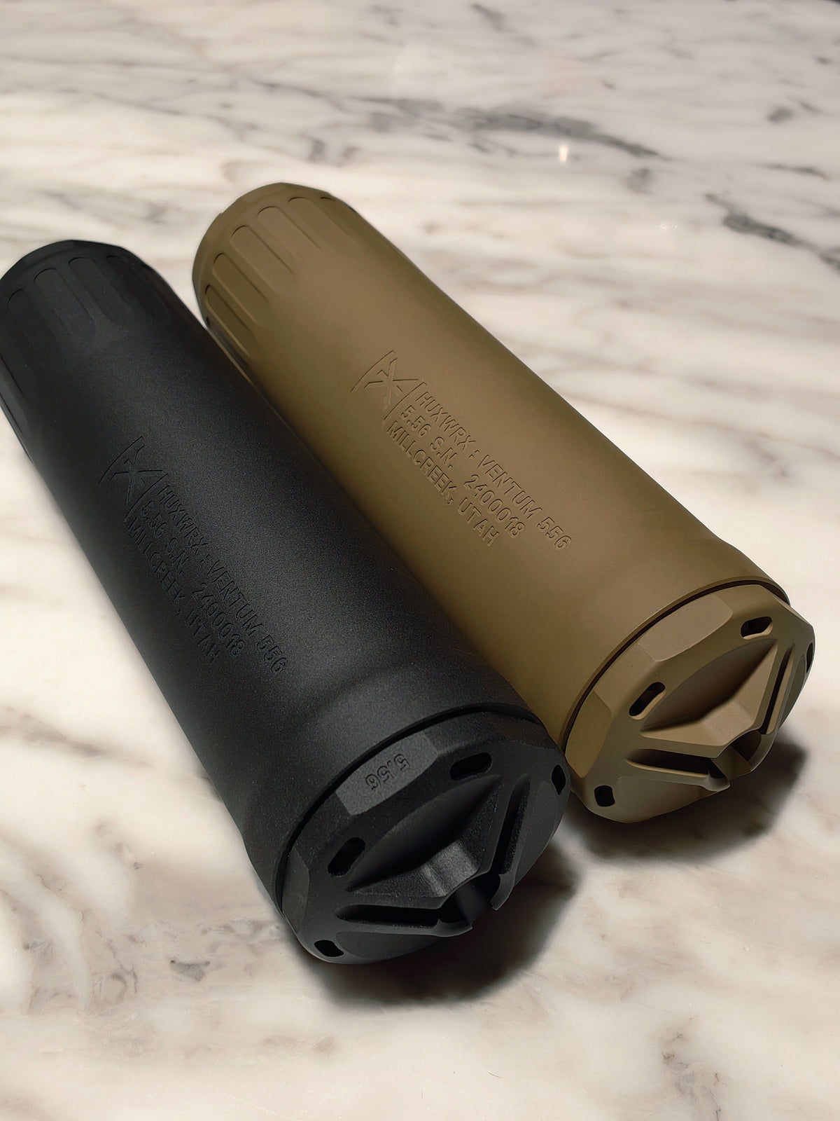 Detail of a HUXWRX-style airsoft mock suppressor from JXAirsoft
